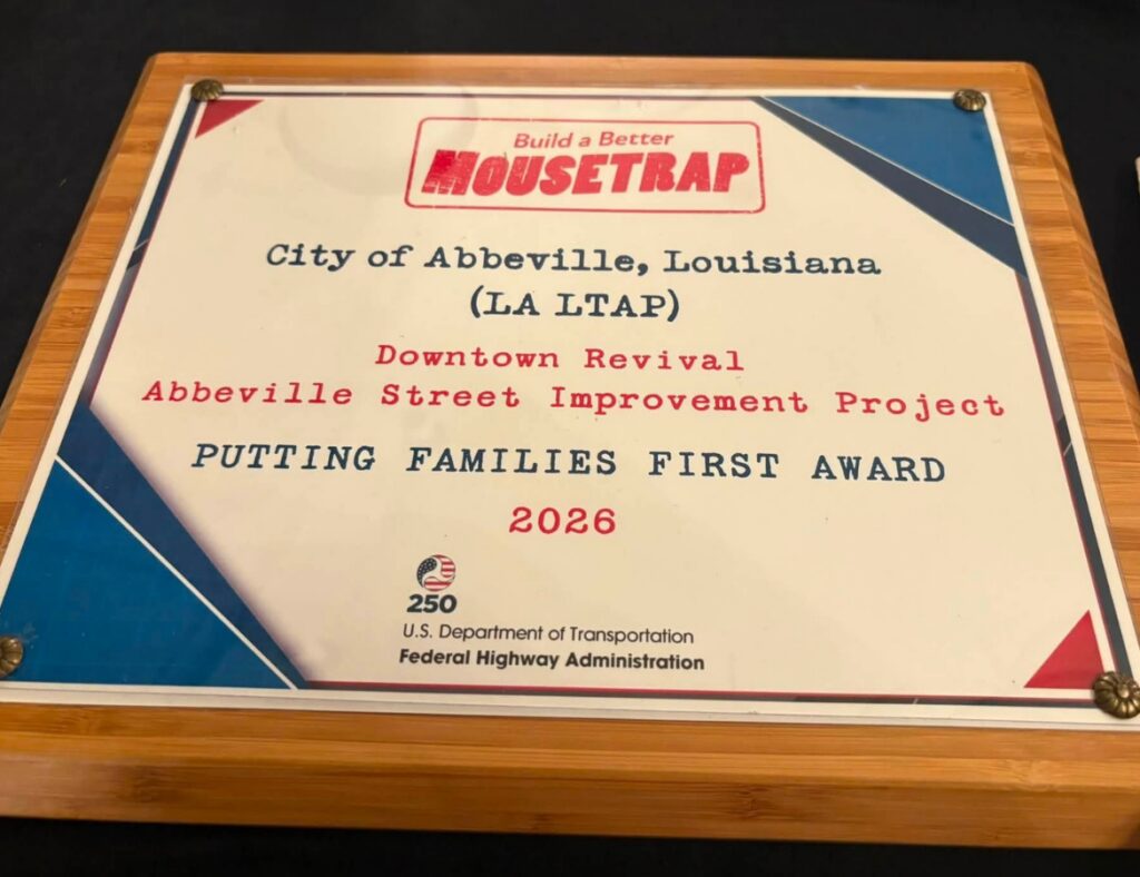 Close-up of the City of Abbeville's 2026 National Winner award plaque from the Federal Highway Administration's Build a Better Mousetrap Innovation Program, recognizing the Downtown Abbeville Street Improvement Project in the Putting Families First category.